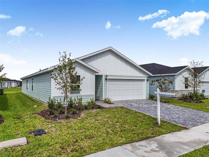 Front exterior of a new home in , Palm Coast, FL, highlighting curb appeal (Image 26). Front exterior of a new home in , Palm Coast, FL, highlighting curb appeal (Image 26).