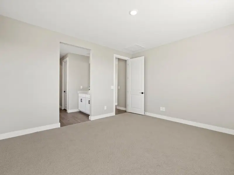 Spacious, unfurnished interior of a new home in White Tank Foothills Reserve Series, Waddell (Image 15). Spacious, unfurnished interior of a new home in White Tank Foothills Reserve Series, Waddell (Image 15).