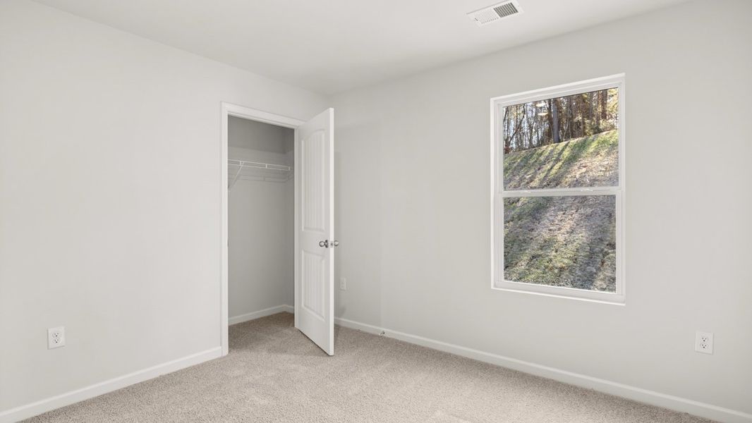 Representative unfurnished interior of a home built from the Hayden by D.R. Horton in Aurora Creek, Dallas (Image 28).
