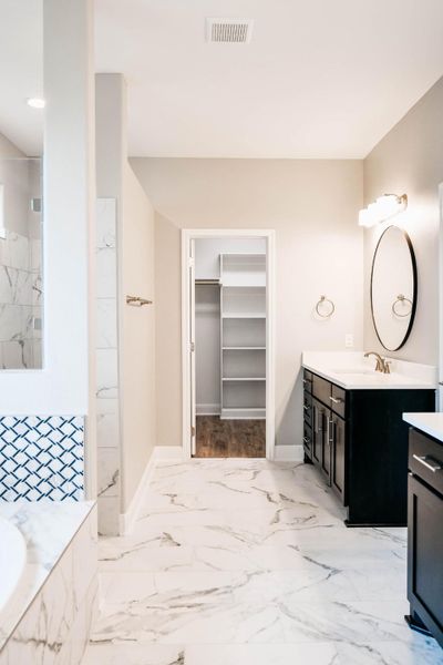 Furnished interior in a model home at Escalera Ranch 1833 in Victoria (Image 14).