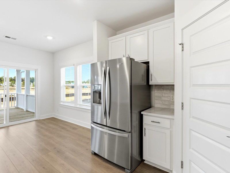 Furnished interior view inside a new home in The Coves at Lakes of Cane Bay, Summerville (Image 18). Furnished interior view inside a new home in The Coves at Lakes of Cane Bay, Summerville (Image 18).