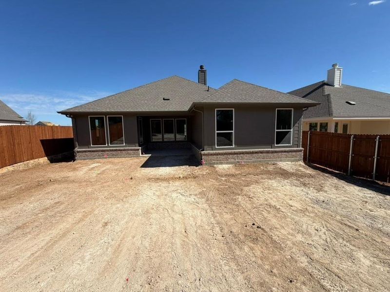 Exterior details and patio area of a home in Waterford Park, Weatherford (Image 3). Exterior details and patio area of a home in Waterford Park, Weatherford (Image 3).