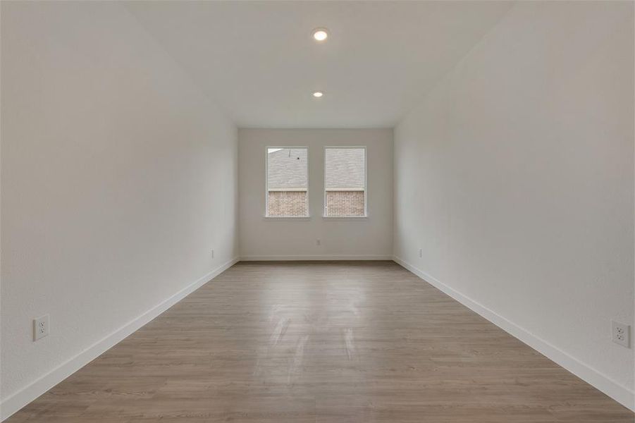 Unfurnished room featuring light hardwood / wood-style flooring