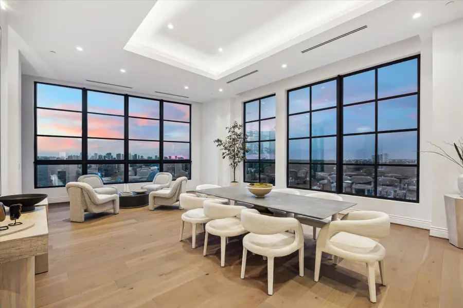 The light-filled gathering room has a definite “wow” factor with its breathtaking views. Here modern design meets understated luxury. The light-filled gathering room has a definite “wow” factor with its breathtaking views. Here modern design meets understated luxury.