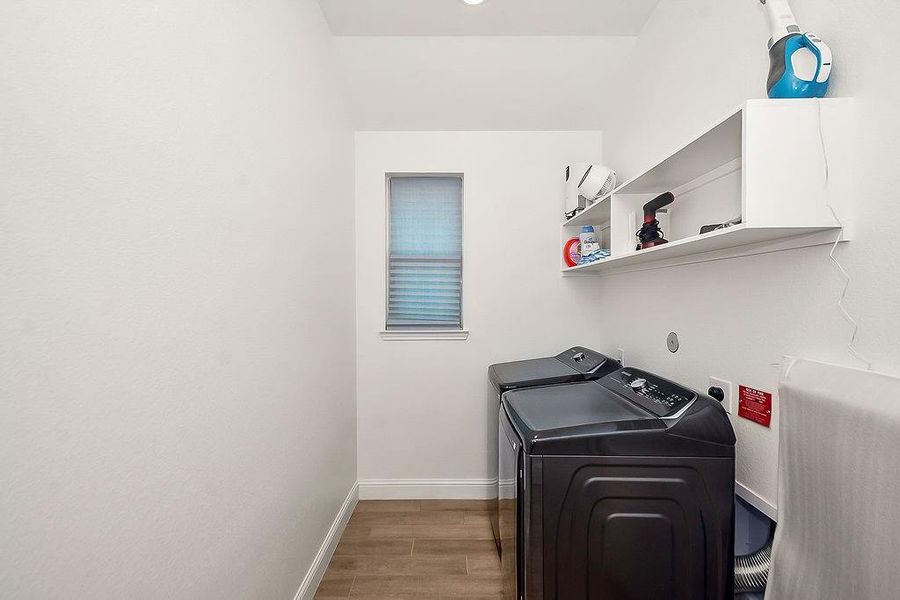 Large laundry room with space for more storage, extra fridge, etc is perfect Large laundry room with space for more storage, extra fridge, etc is perfect