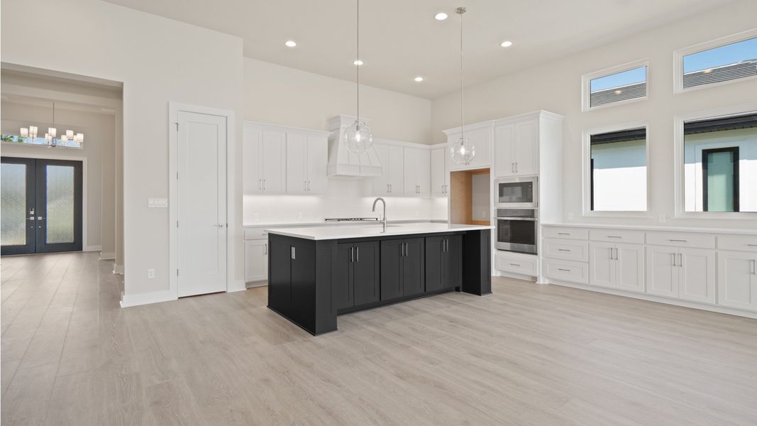 Furnished interior view inside a new home in Glynlea Country Club, Port St. Lucie (Image 4).