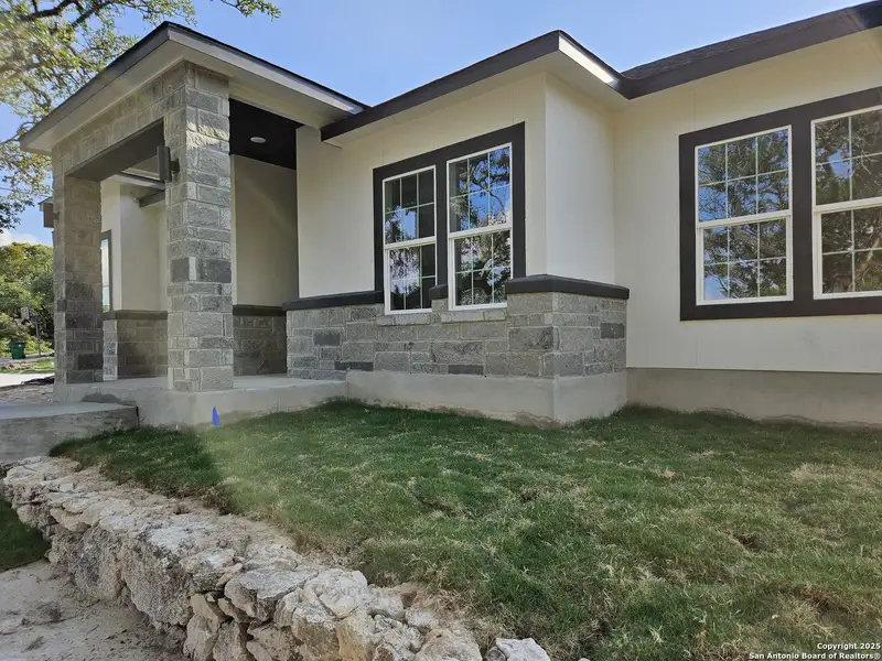 Exterior details and patio area of a home in , Spring Branch (Image 17). Exterior details and patio area of a home in , Spring Branch (Image 17).