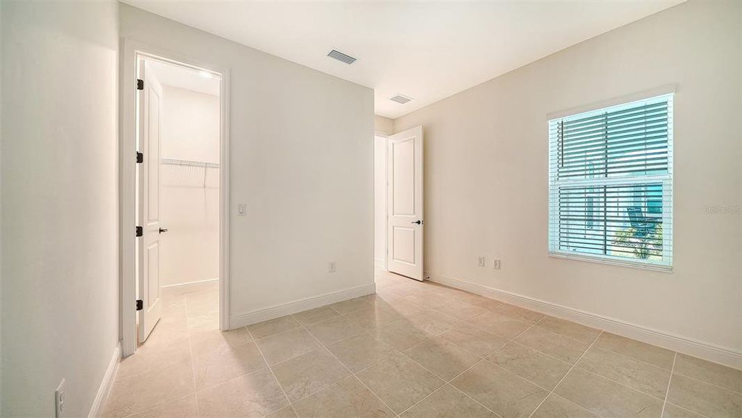 Spacious, unfurnished interior of a new home in Windward Real Estate and Homes for Sale in Sarasota, FL - Neal Communities, Lakewood Ranch (Image 28).