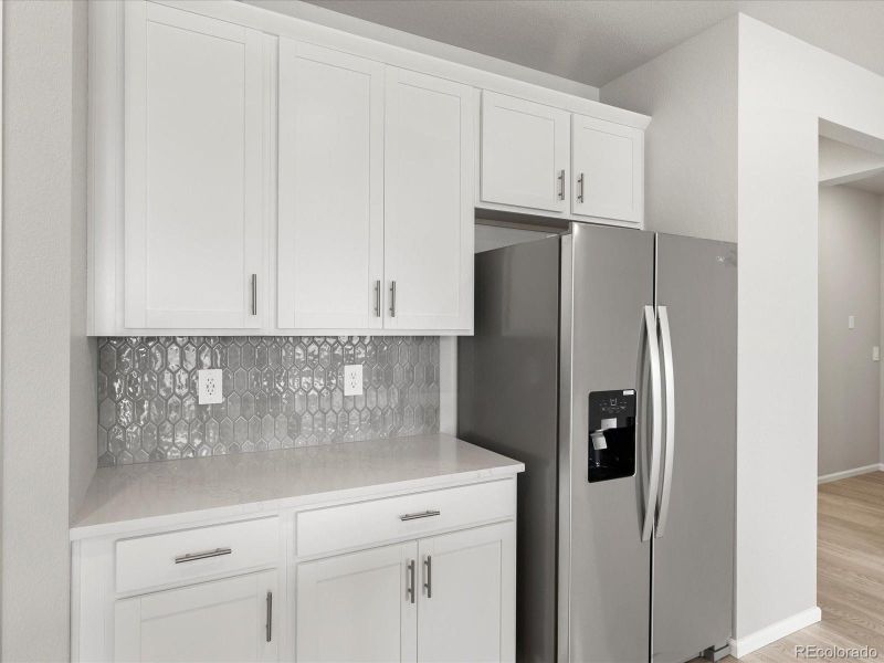 Furnished interior view inside a new home in Buffalo Highlands: The Canyon Collection, Commerce City (Image 8).