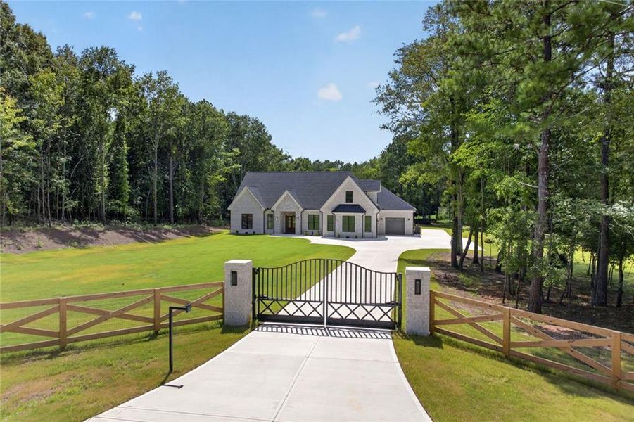 Front exterior of a new home in , Monroe, GA, highlighting curb appeal (Image 32). Front exterior of a new home in , Monroe, GA, highlighting curb appeal (Image 32).