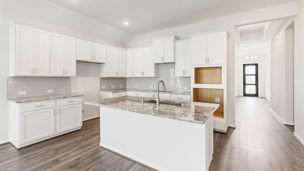 Furnished interior view inside a new home in Sunterra, Katy (Image 3).