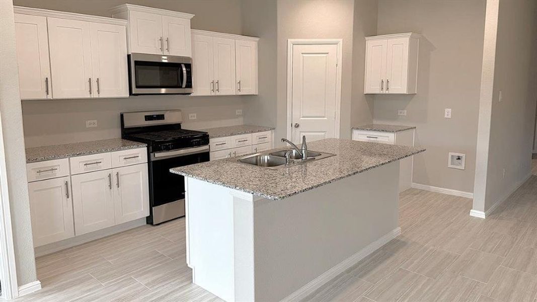 Kitchen - All Home and community information, including pricing, included features, terms, availability and amenities, are subject to change at any time without notice or obligation. All Drawings, pictures, photographs, video, square footages, floor plans, elevations, features, colors and sizes are approximate for illustration purposes only and will vary from the homes as built. Kitchen - All Home and community information, including pricing, included features, terms, availability and amenities, are subject to change at any time without notice or obligation. All Drawings, pictures, photographs, video, square footages, floor plans, elevations, features, colors and sizes are approximate for illustration purposes only and will vary from the homes as built.