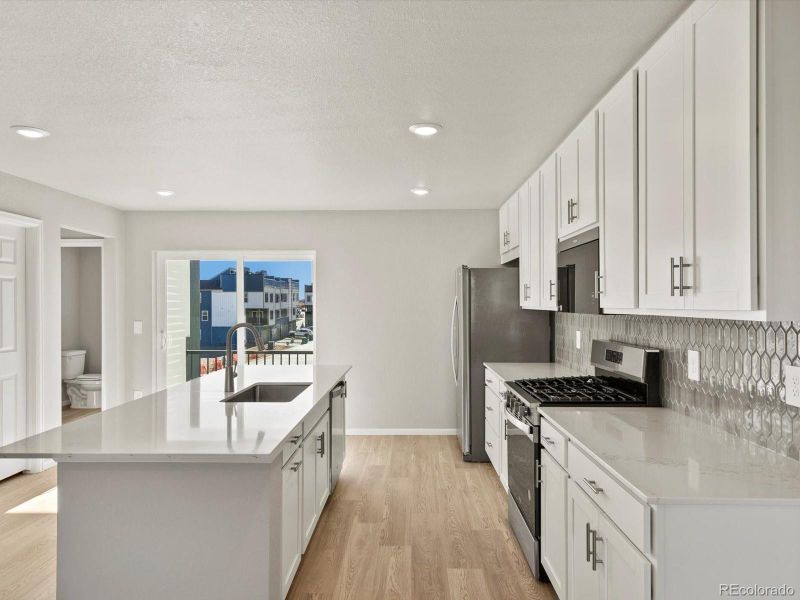 Furnished interior view inside a new home in Three Hills, Morrison (Image 16).