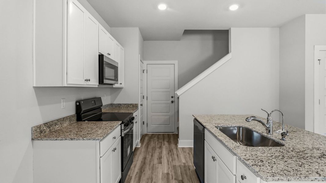 Furnished interior view inside a new home in Chateau Nemours, Port Saint Joe (Image 6).