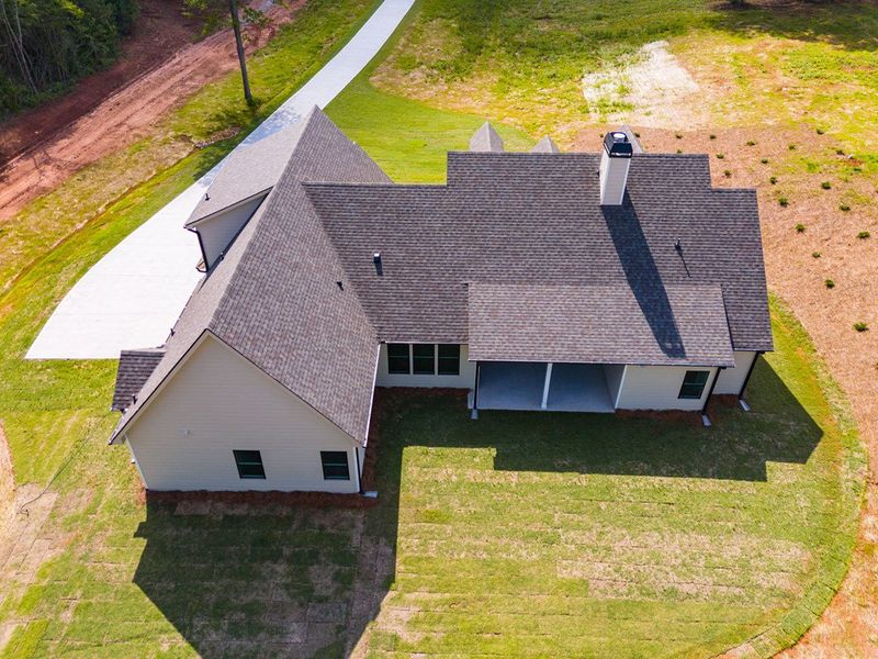 Exterior details and patio area of a home in Harmon Springs, Carrollton (Image 4).