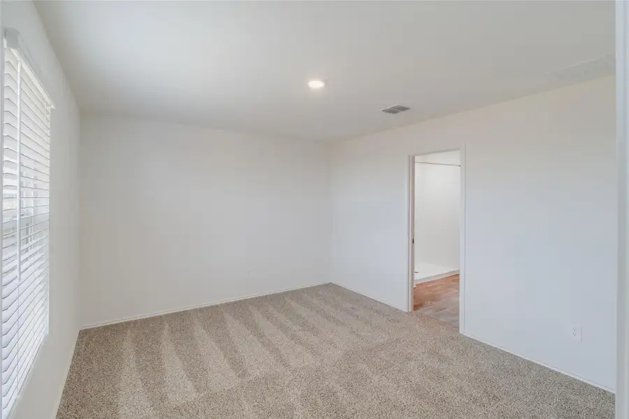 Spacious, unfurnished interior of a new home in Prairie Lakes, Buda (Image 9). Spacious, unfurnished interior of a new home in Prairie Lakes, Buda (Image 9).