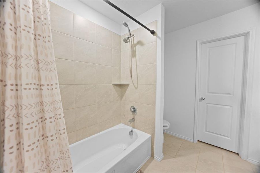 Furnished interior view inside a new home in Mobberly Farms: Watermill Collection, Pilot Point (Image 5).