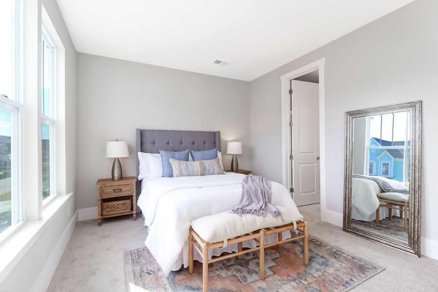 Representative furnished interior of a home built from the Inverness P by True Homes in Homecoming, Ravenel (Image 13).