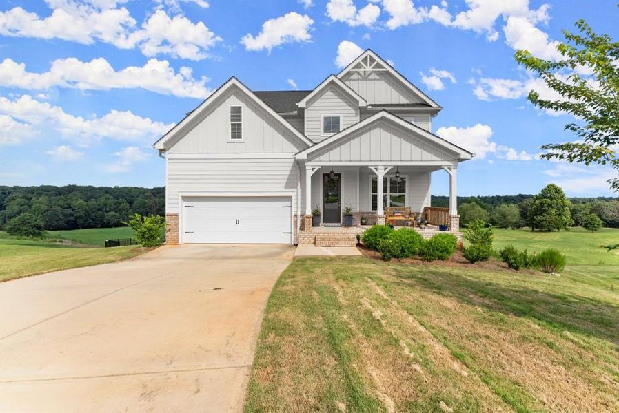 Front exterior of a new home in , Homer, GA, highlighting curb appeal (Image 2).