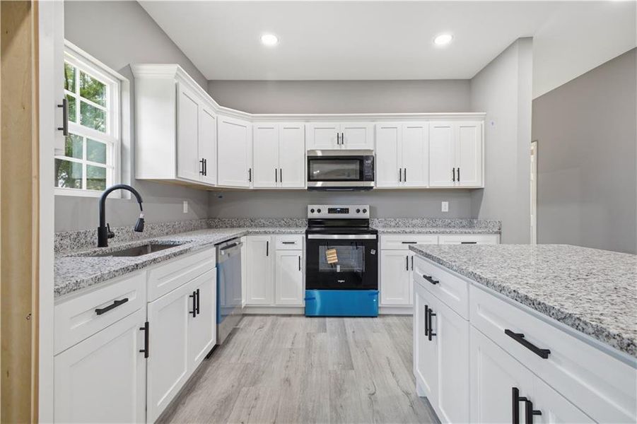 Furnished interior view inside a new home in , Calhoun (Image 6).