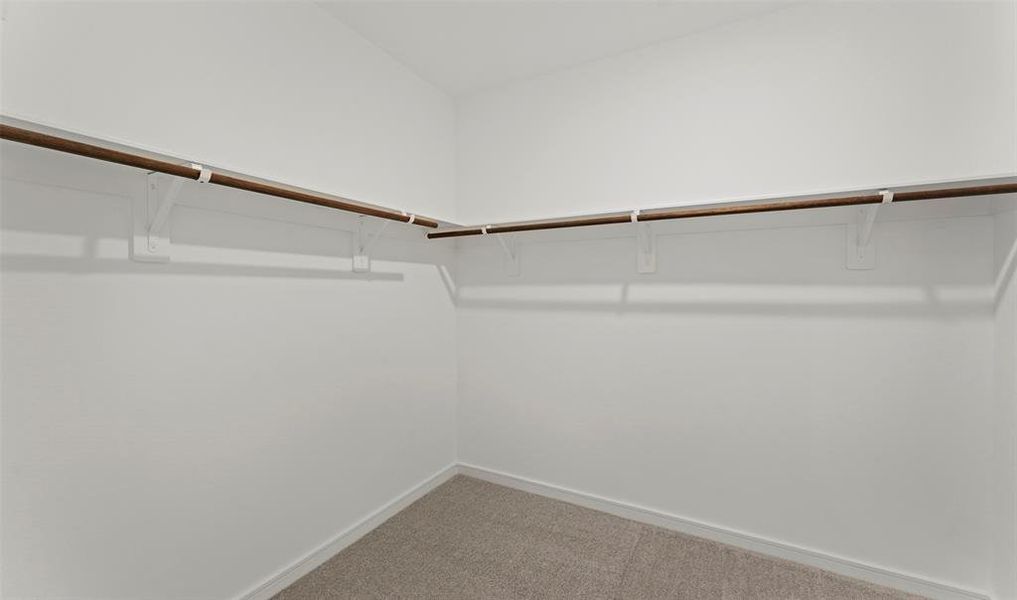 Large walk-in closet in the primary bedroom. (*Photo not of actual home and used for illustration purposes only.)