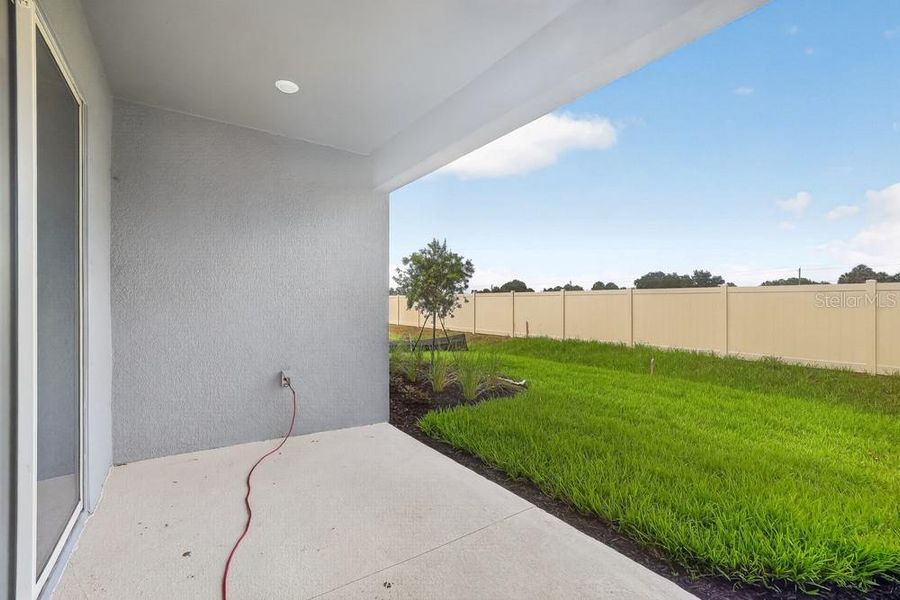 Exterior details and patio area of a home in Indigo Creek, Apollo Beach (Image 3). Exterior details and patio area of a home in Indigo Creek, Apollo Beach (Image 3).