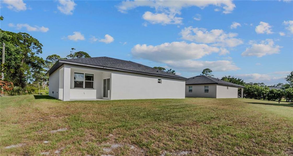 Exterior details and patio area of a home in , Sebring (Image 22).