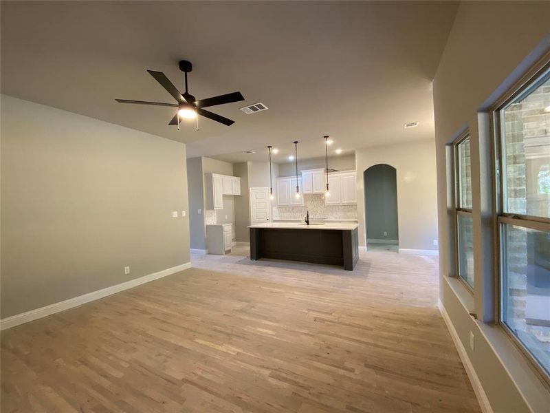 Open light & bright great room (hardwoods not stained Aged Barrel Grey w/Black tint yet) Open light & bright great room (hardwoods not stained Aged Barrel Grey w/Black tint yet)