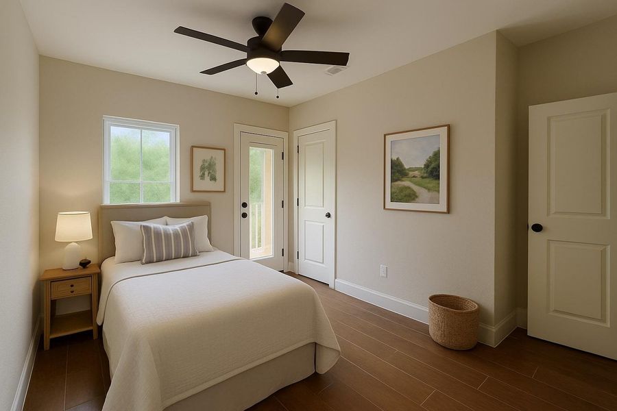 Bedroom featuring wood finished floors and a ceiling fan