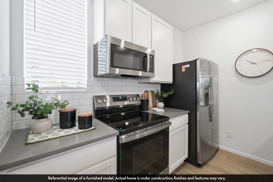 Furnished interior view inside a new home in Municipal Drive Townhomes, Leander (Image 5).