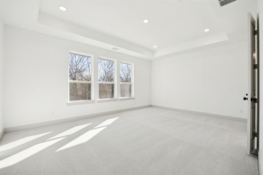 Located at the rear of the home for additional privacy, this dreamy owner's suite was designed for rest and relaxation! Located at the rear of the home for additional privacy, this dreamy owner's suite was designed for rest and relaxation!