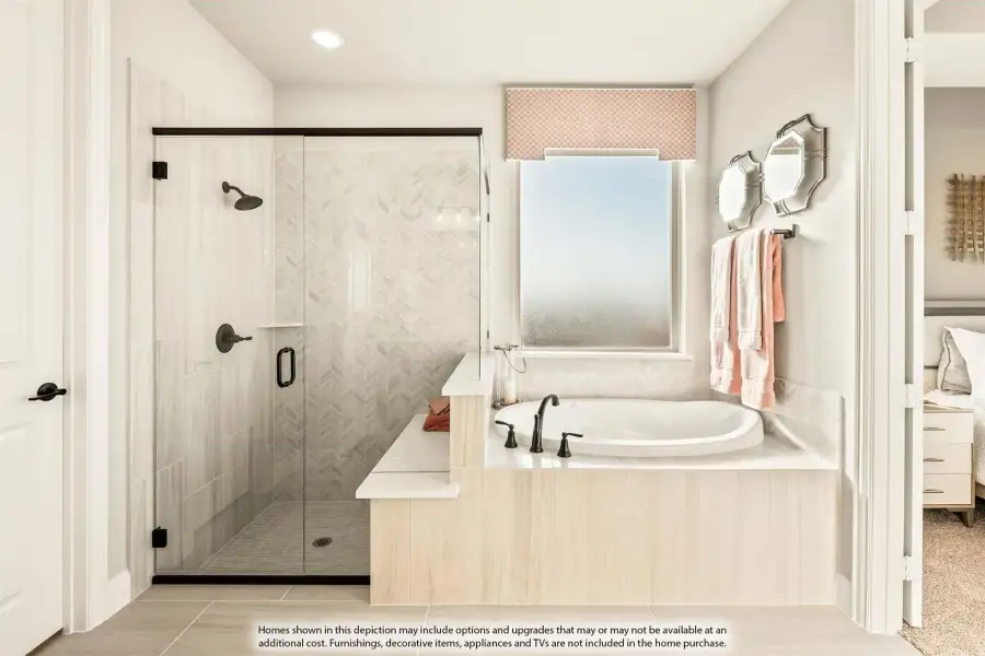 Master bathroom with soaking tub, glass-enclosed shower, herringbone tile walls, and black fixtures