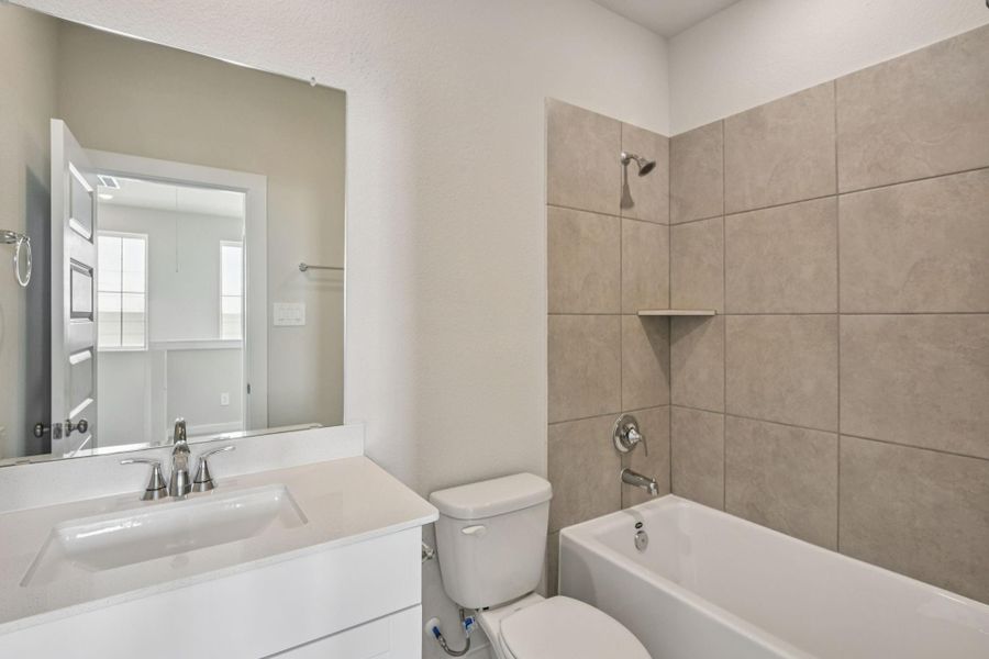 Furnished interior view inside a new home in Kemah Crossing - City Series, Kemah (Image 9).