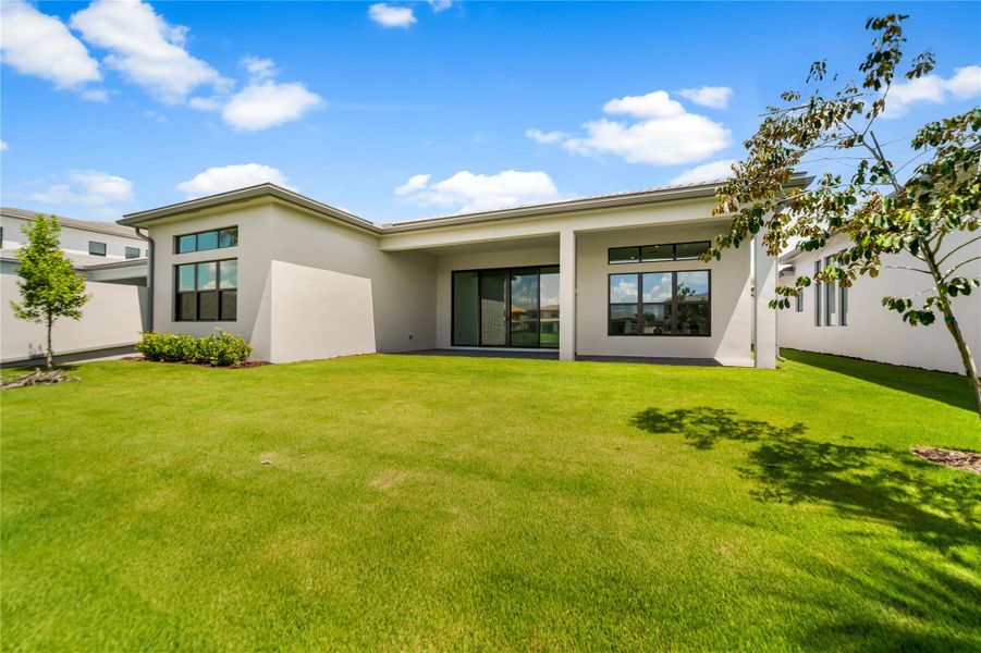 Front exterior of a new home in , Boca Raton, FL, highlighting curb appeal (Image 2). Front exterior of a new home in , Boca Raton, FL, highlighting curb appeal (Image 2).