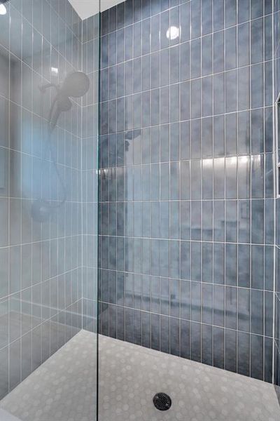 Bathroom with tiled shower