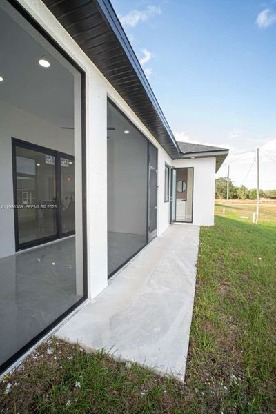 Exterior details and patio area of a home in , Lehigh Acres (Image 3).