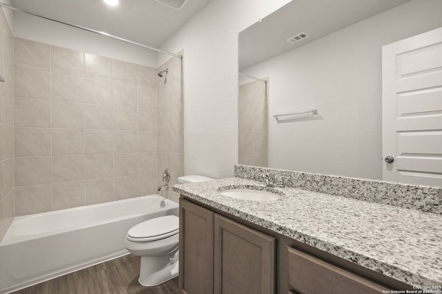 Furnished interior view inside a new home in Hunters Ranch, San Antonio (Image 5).