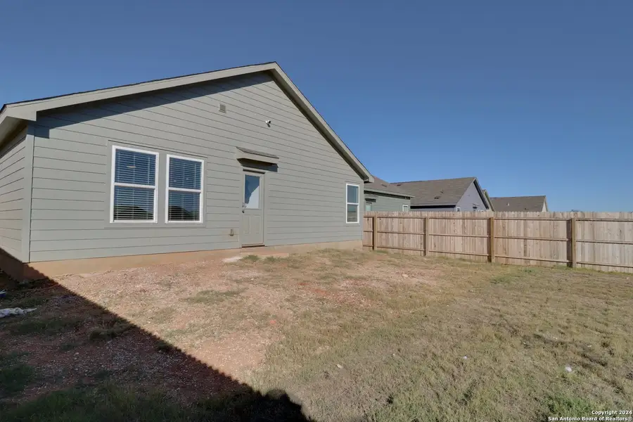 Front exterior of a new home in Friendship Oaks, Fredericksburg, TX, highlighting curb appeal (Image 11). Front exterior of a new home in Friendship Oaks, Fredericksburg, TX, highlighting curb appeal (Image 11).