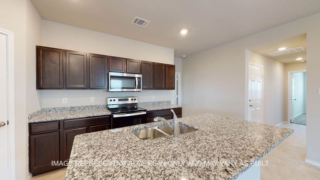 Representative furnished interior of a home built from the Camden by D.R. Horton in Victory Ranch, Killeen (Image 5).