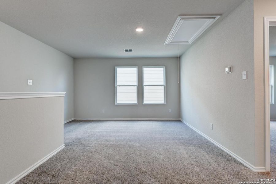 Spacious, unfurnished interior of a new home in Meadows at Hennersby Hollow 40's, San Antonio (Image 29).