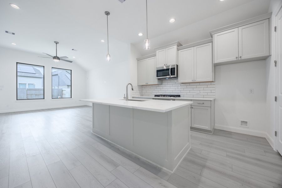 Representative furnished interior of a home built from the Elias by Risewell Homes in Sunterra, Katy (Image 3). Representative furnished interior of a home built from the Elias by Risewell Homes in Sunterra, Katy (Image 3).