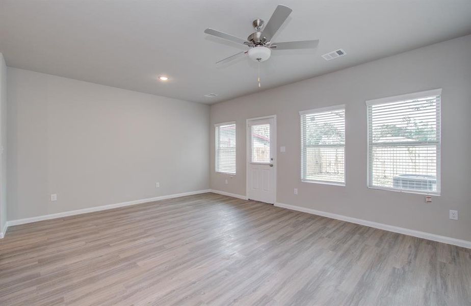 Open concept kitchen/dining living area located on first floor