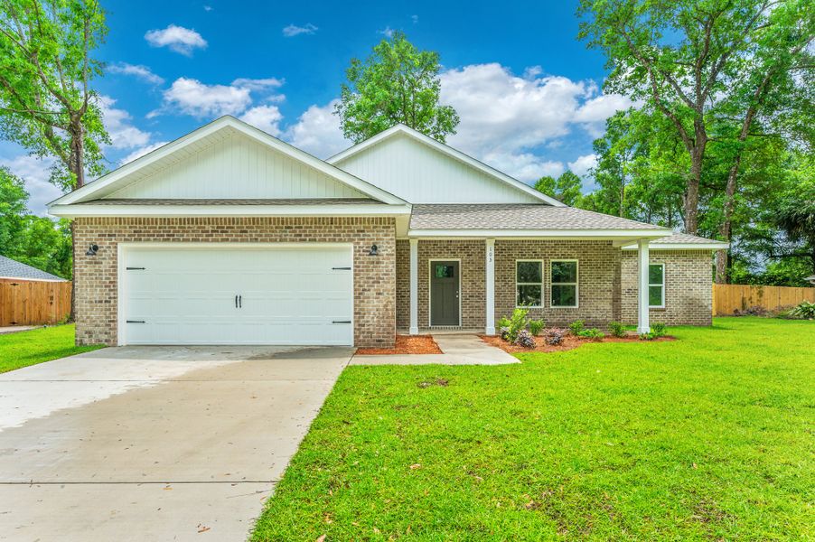 Front exterior of a new home in Barton's Bend, Crestview, FL, highlighting curb appeal (Image 1). Front exterior of a new home in Barton's Bend, Crestview, FL, highlighting curb appeal (Image 1).