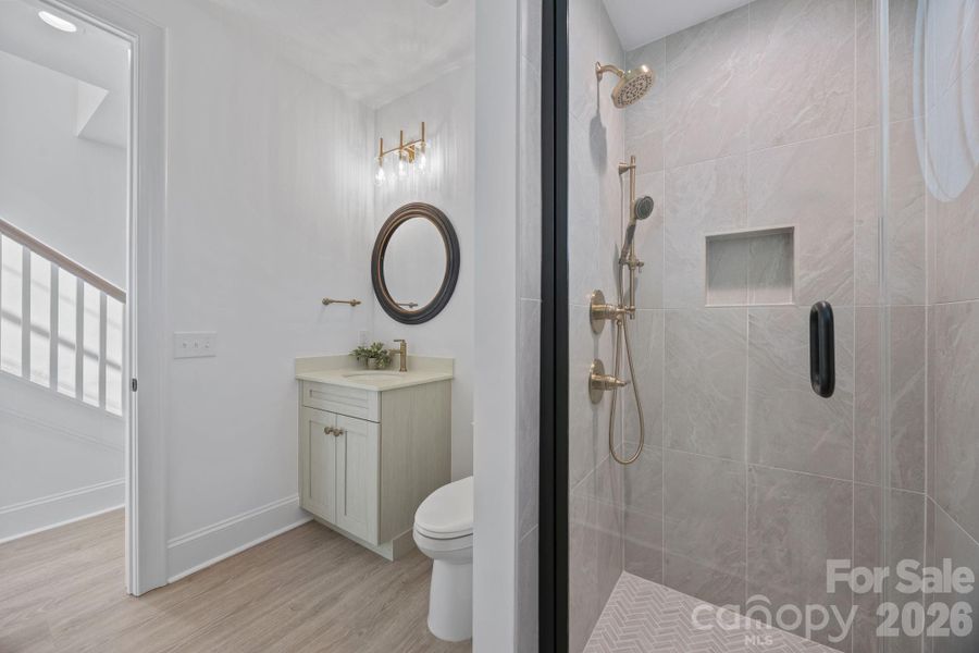 Tile shower with handheld