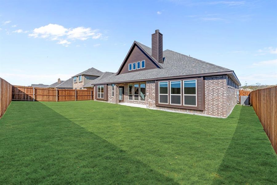 Exterior details and patio area of a home in Georgetown at Kings Fort 60s, Kaufman (Image 3).