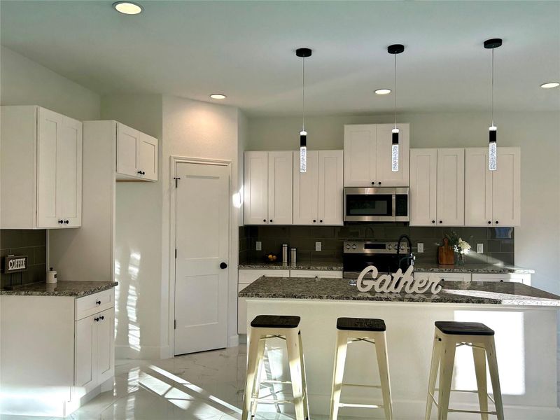 Kitchen island with seating area.