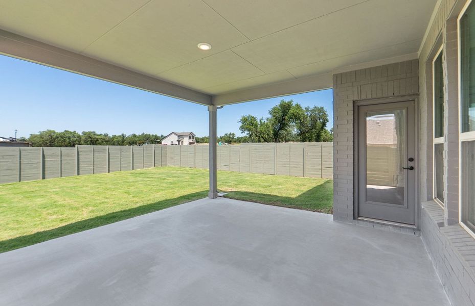 Exterior details and patio area of a home in Wolf Ranch, Georgetown (Image 29). Exterior details and patio area of a home in Wolf Ranch, Georgetown (Image 29).
