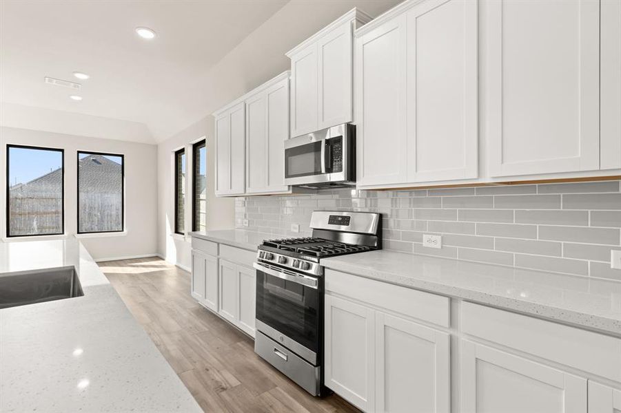 This kitchen is not only a functional space but also has ample storage. Whether you're a seasoned chef or just love to gather and enjoy good food, this kitchen is a dream come true.