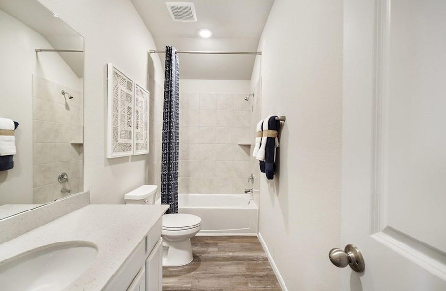 Furnished interior view inside a new home in Laurel Landing: Founders Collection, Alvin (Image 11).