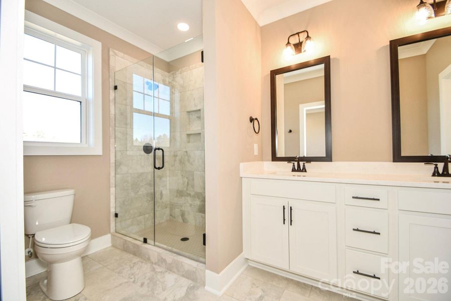 Furnished interior view inside a new home in , Wingate (Image 12).